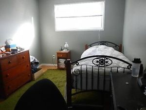 bedroom grey w bed.jpg