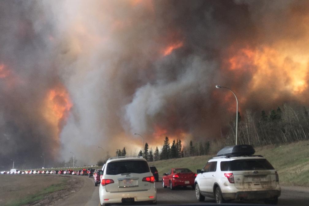 Landscape_view_of_wildfire_near_Highway_63.jpg