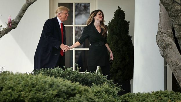 Ms Hicks departs the White House on her last day as communications director (March 2018)