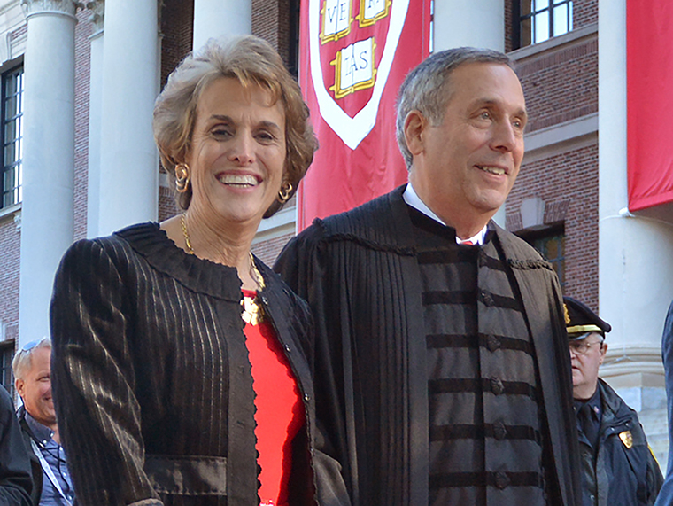 Lawrence Bacow, right, and his wife Adele Fleet Bacow leave Harvard Yard after his inauguration as the 29th President of Harvard University, Friday, October 5, 2018 in Cambridge, Massachusetts.