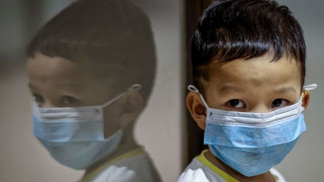 A child wearing a facemask at the Ninoy Aquino International Airport in Manila