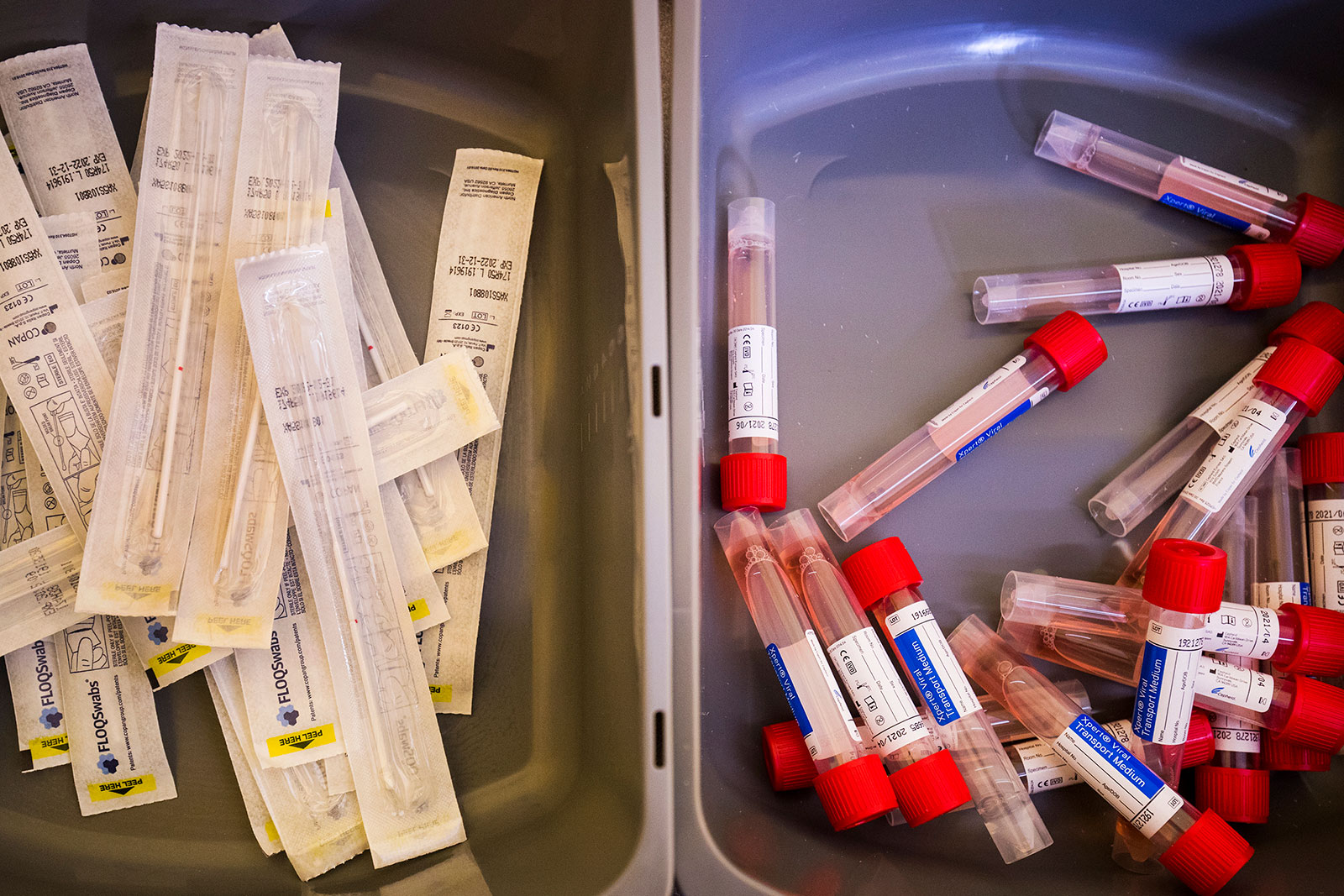 Vials and swabs sit in bins at a coronavirus testing center in Newton, Massachusetts, on March 18.