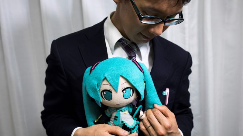 _108346012_holdingmiku_getty976b.jpg