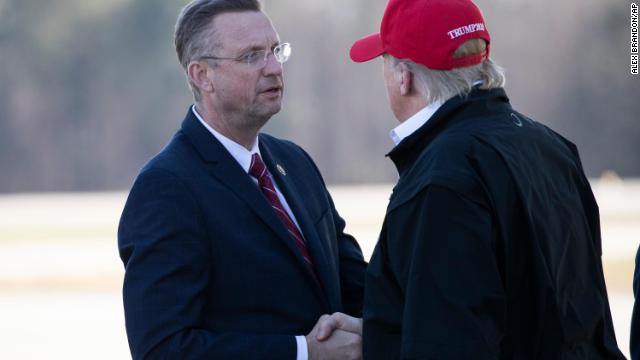 Rep. Doug Collins greets President Trump as he steps off Air Force One during arrival on March 6 at Dobbins Air Reserve Base in Marietta, Georgia.