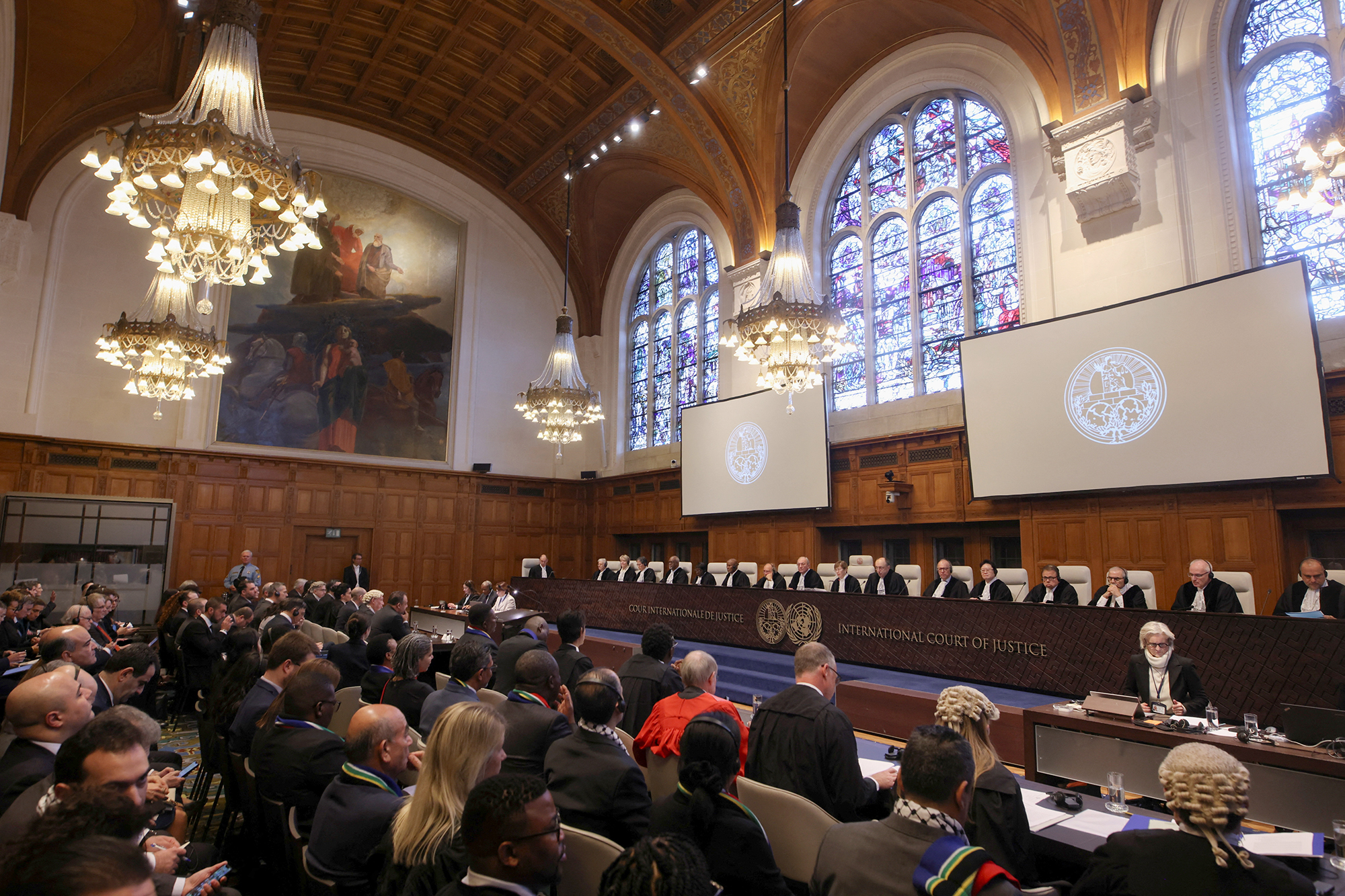 People sit inside the International Court of Justice (ICJ) in The Hague, Netherlands, on January 11.