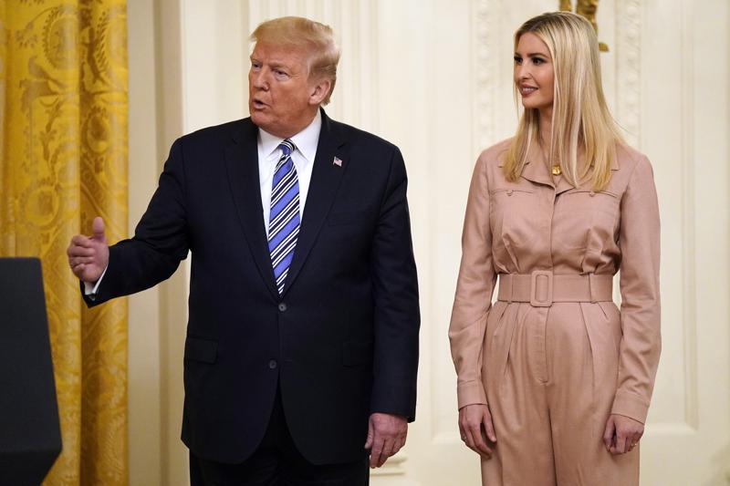 FILE - President Donald Trump speaks during an event about the Paycheck Protection Program used to support small businesses during the coronavirus outbreak, in the East Room of the White House, April 28, 2020, in Washington, as Ivanka Trump listens. New York Attorney General Letitia James recently subpoenaed former President Donald Trump and his two eldest children, demanding their testimony in connection with an ongoing civil investigation into the family's business practices, according to a court filing made public Monday, Jan. 3, 2022. (AP Photo/Evan Vucci, File)