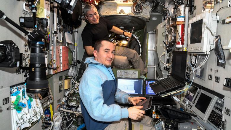 NASA astronaut Mark Vande Hei (background) and Roscosmos cosmonaut Pyotr Dubrov launched to the space station in April 2021.