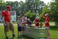 Two adults and four children enjoying activities at Cumberland Museum.