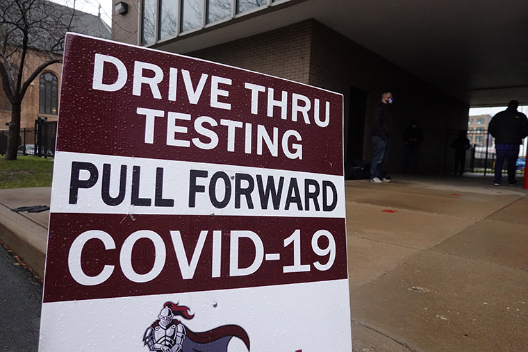 Residents arrive for COVID-19 and COVID-19 antibody tests at a mobile test site being run by Roseland Community Hospital on December 12, 2020 in Chicago, Illinois. 