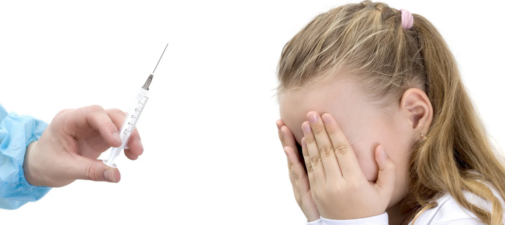 scared-kid-getting-neddle-1024x457.png
