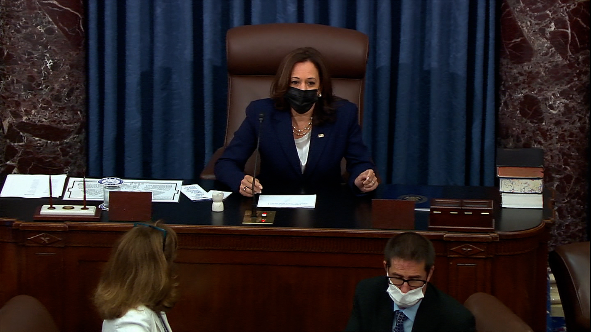 Vice President Kamala Harris announces the final vote on August 10, 2021.