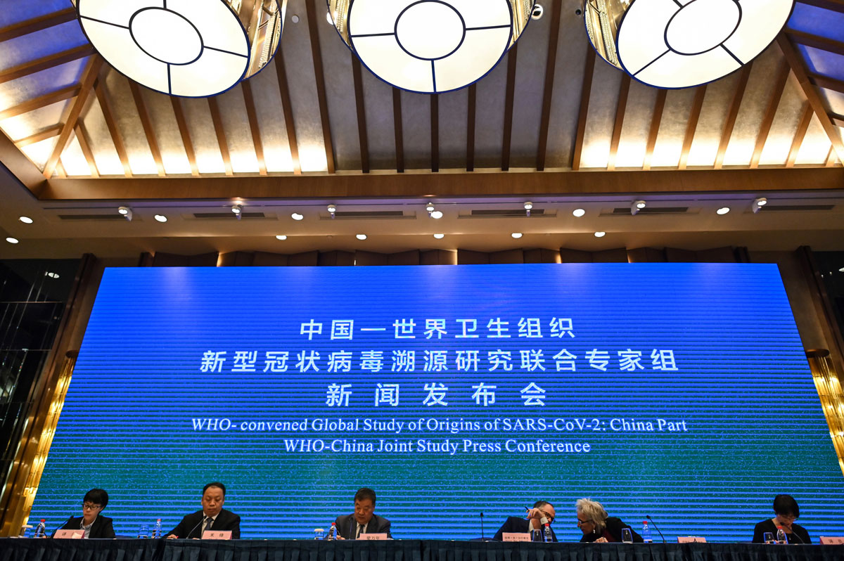 World Health Organization experts attend a news conference with Chinese health officials in Wuhan on February 9, 2021.