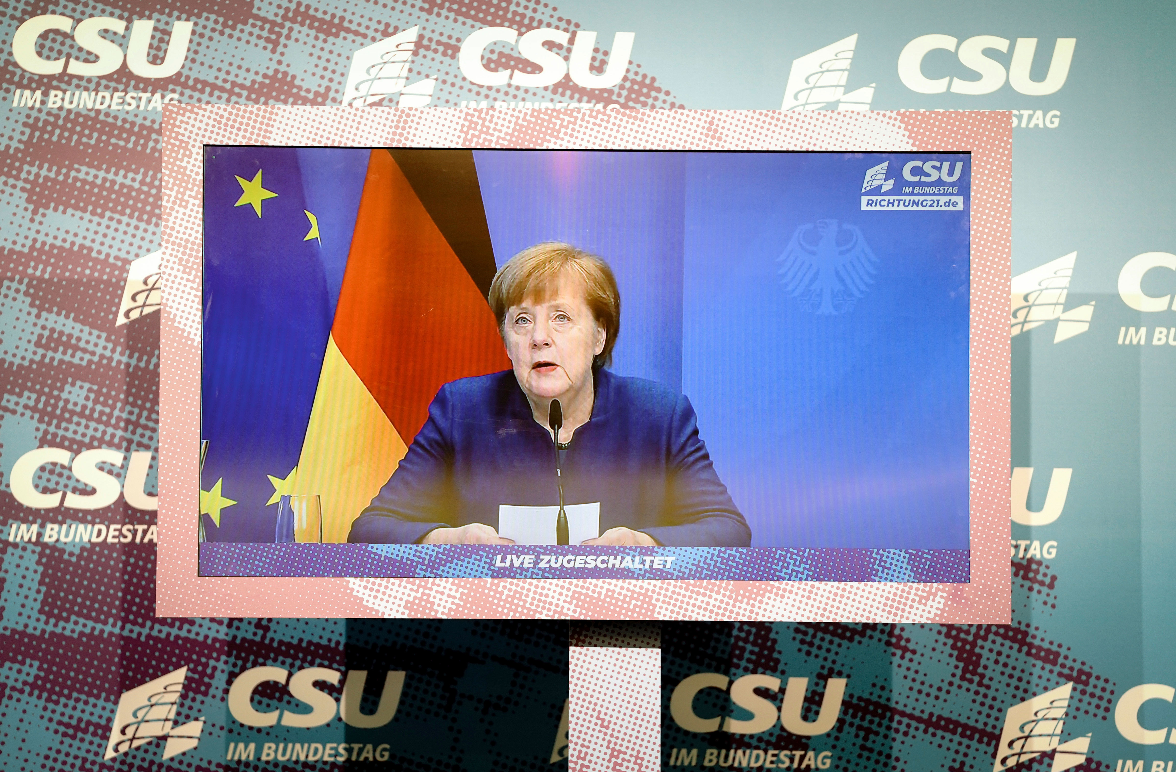 German Chancellor Angela Merkel makes a statement in Berlin on January 7 — about the previous day's riots in Washington, DC — during a Christian Social Union parliamentary group digital press conference.