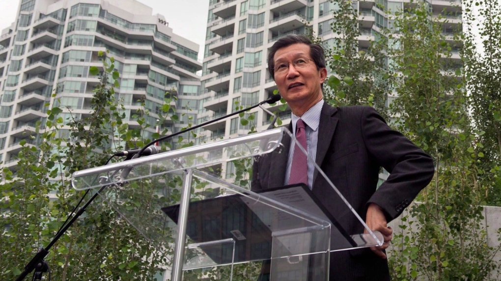 Former Ontario cabinet minister Michael Chan is suing the Canadian Security Intelligence Service and unidentified employees who he says leaked classified information with the intent of harming his reputation. Chan speaks about Toronto Pan Am/Parapan Am Games on August 28, 2013. THE CANADIAN PRESS/Galit Rodan