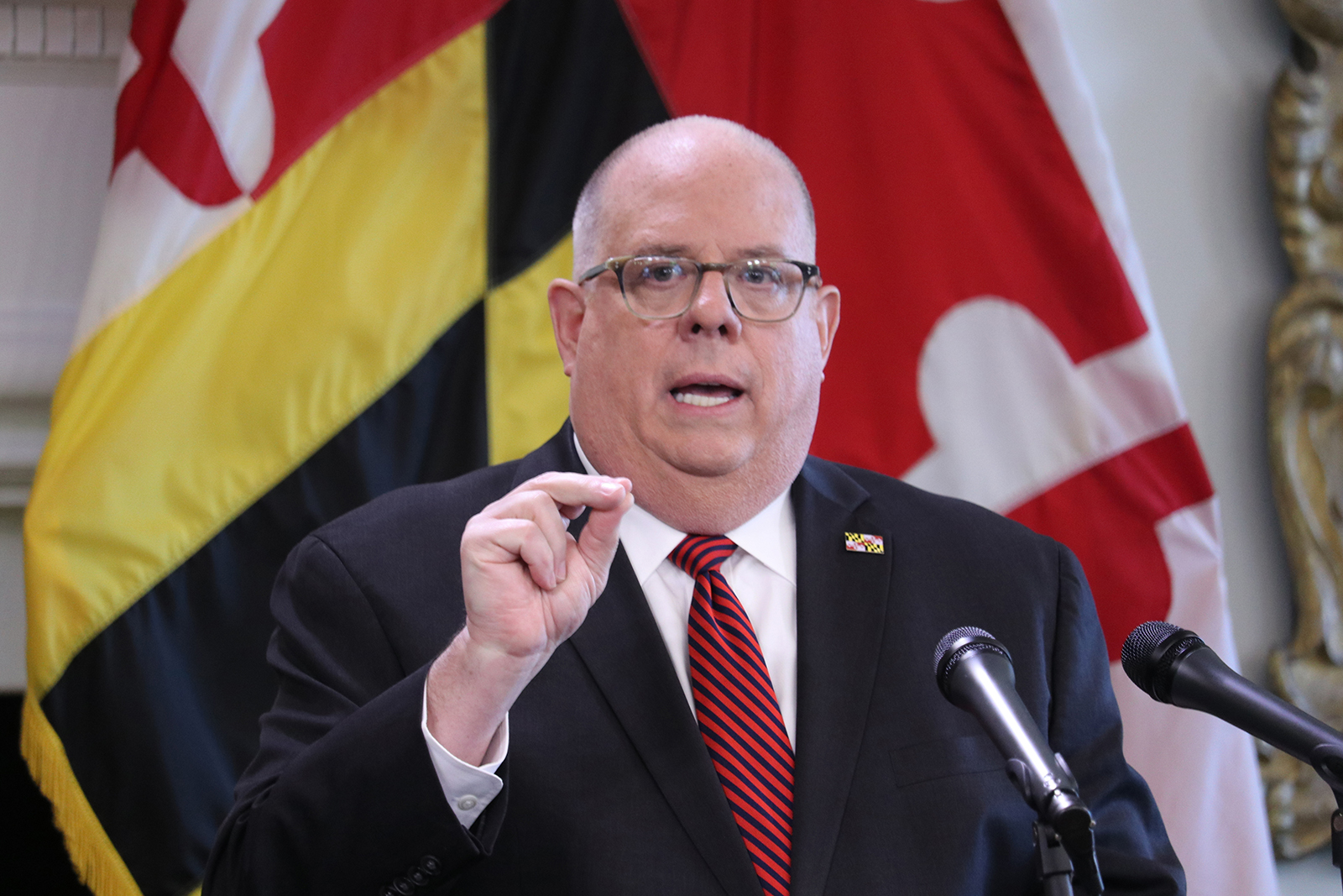 FILE - In this June 3, 2020 file photo Maryland Gov. Larry Hogan speaks during a news conference in Annapolis, Md. Gov. Hogan will be stepping down as the chairman of the the bipartisan National Governors Association. New York Gov. Andrew Cuomo takes the reins of the group representing the nation’s governors, which has played a pivotal role in communicating with the Trump administration about state needs during the coronavirus pandemic. (AP Photo/Brian Witte, file)