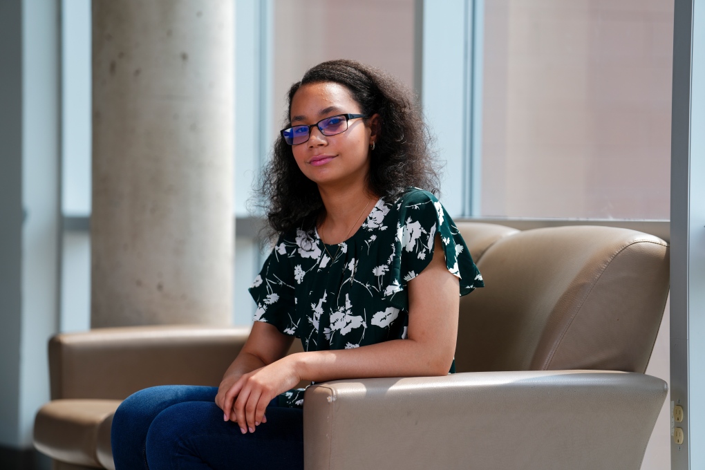 Anthaea-Grace Patricia Dennis who is a 12-year-old graduating from the University of Ottawa's biomedical science program poses for a portrait at the University of Ottawa in Ottawa on Friday, June 2, 2023. THE CANADIAN PRESS/Sean Kilpatrick