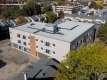 An arial photo of the new three-story building under construction at 20 Dunbar Court.