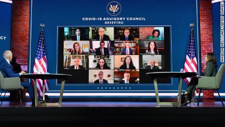 US President-elect Joe Biden(L) and US Vice President-elect Kamala Harris speak virtually with the Covid-19 Advisory Council during a briefing at The Queen theatre on November 9, 2020 in Wilmington, Delaware.