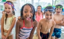 A group of children in swimsuits