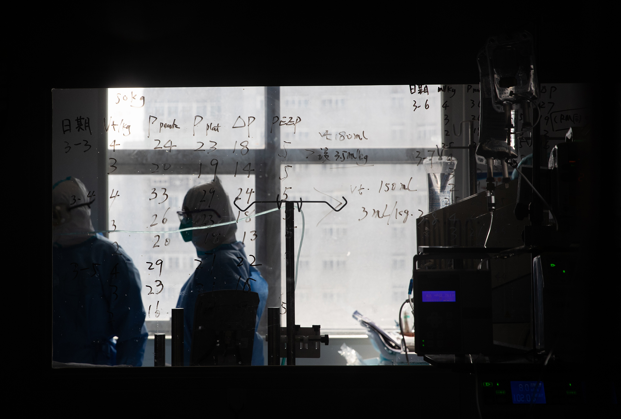 Medical information is seen on a window in a ward treating coronavirus patients at a hospital in Wuhan, in China's Hubei province, on March 19.
