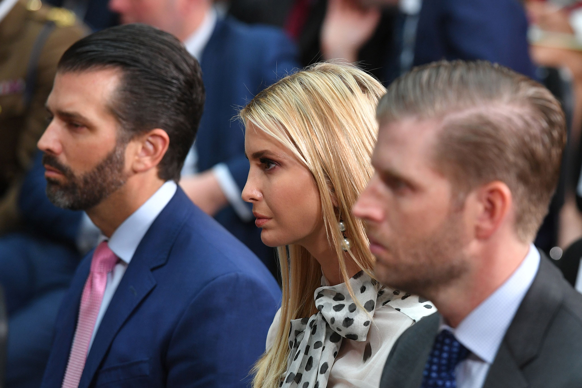 Donald Trump Jr., left, Ivanka Trump, center, and Eric Trump listen during a joint press conference at the Foreign and Commonwealth office in London on June 4, 2019. 