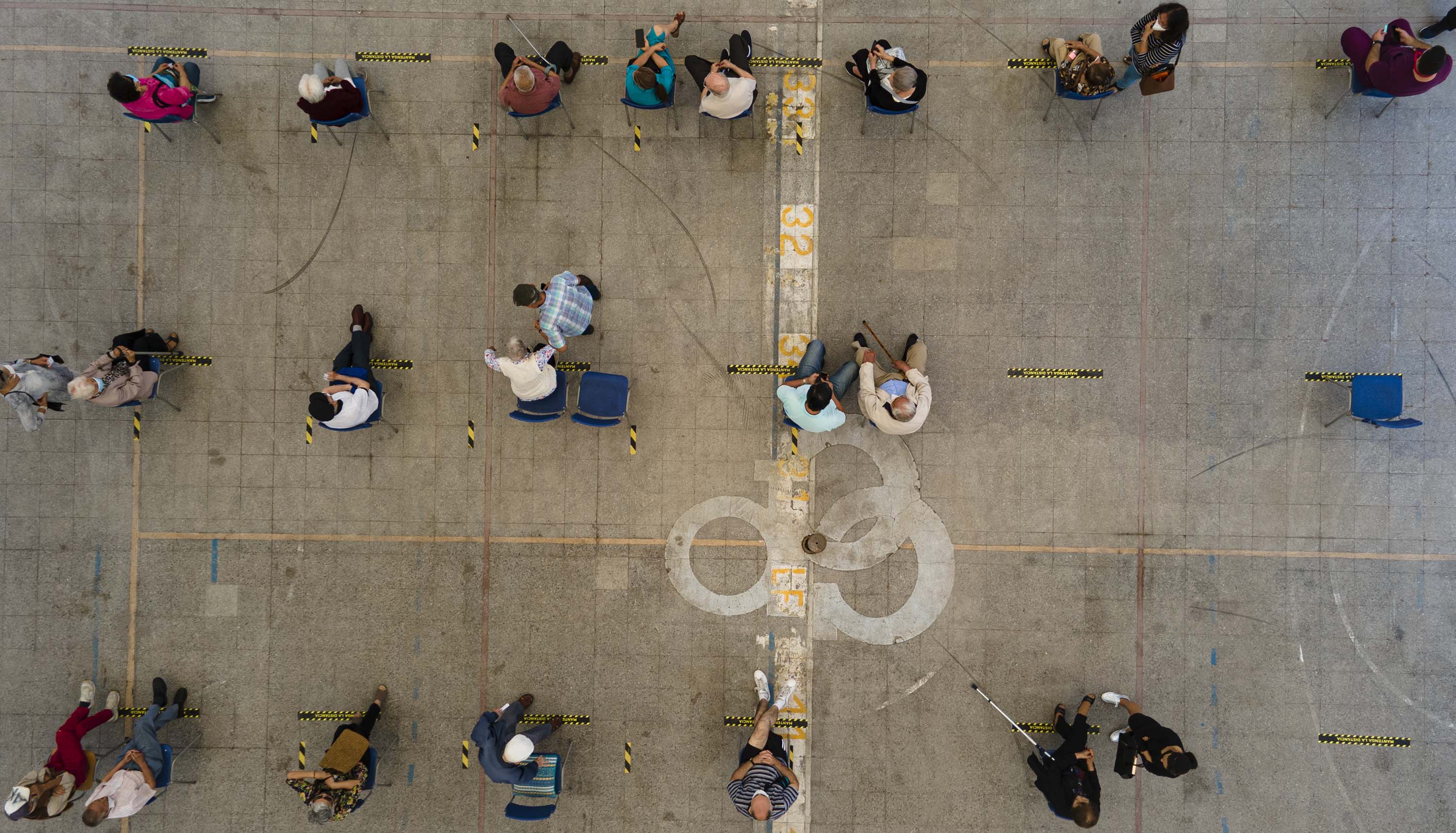 Seniors wait to be vaccinated with China's Sinovac Covid-19 vaccine at a vaccination center in Santiago, Chile, on February 3. 