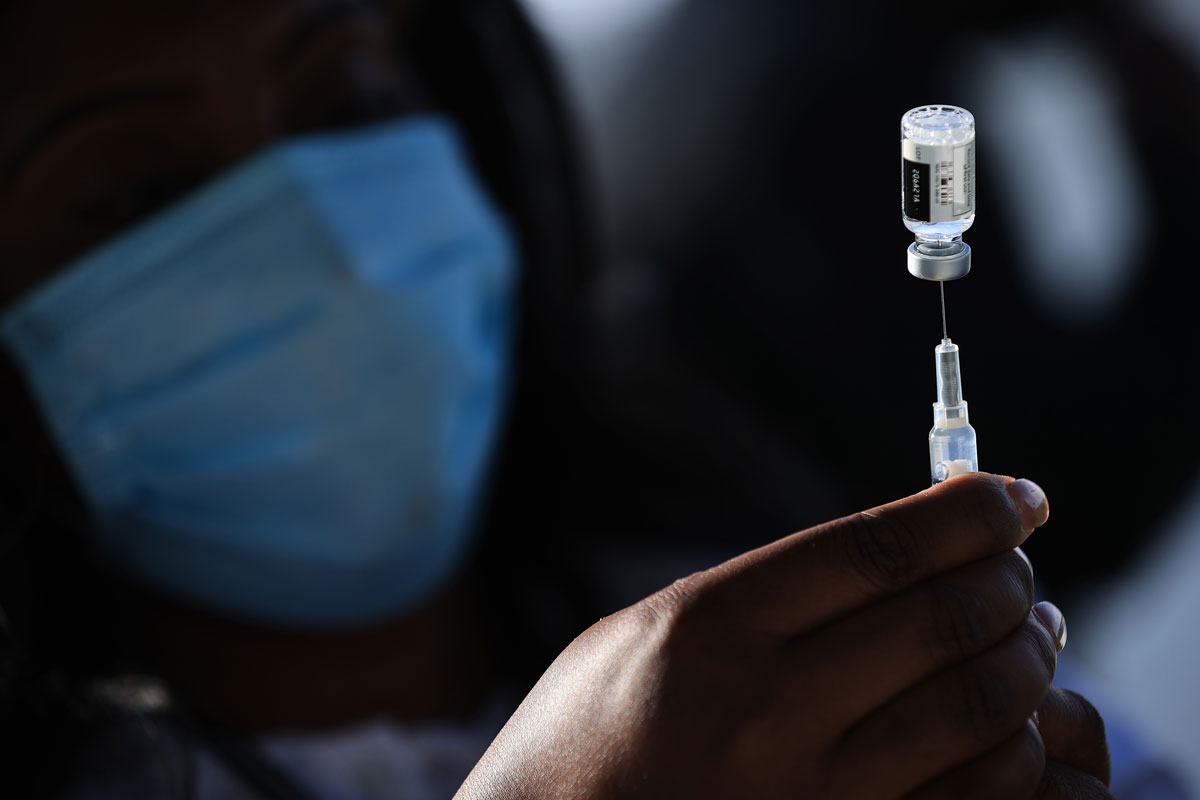 A nurse fills a syrings with a dose of the Johnson & Johnson coronavirus vaccine during a walk-up clinic  in Washington, DC on May 6.