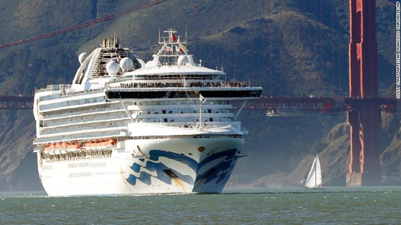 In this photo taken last month, the Grand Princess cruise ship passes the Golden Gate Bridge in San Francisco.