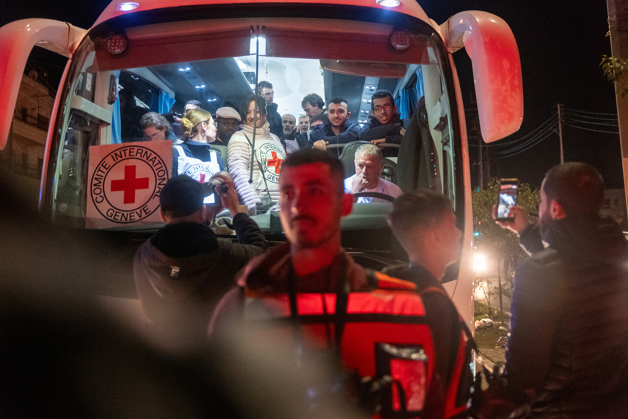 A bus carrying a group of 30 freed Palestinian prisoners arrives in Ramallah, in the West Bank, on November 30.