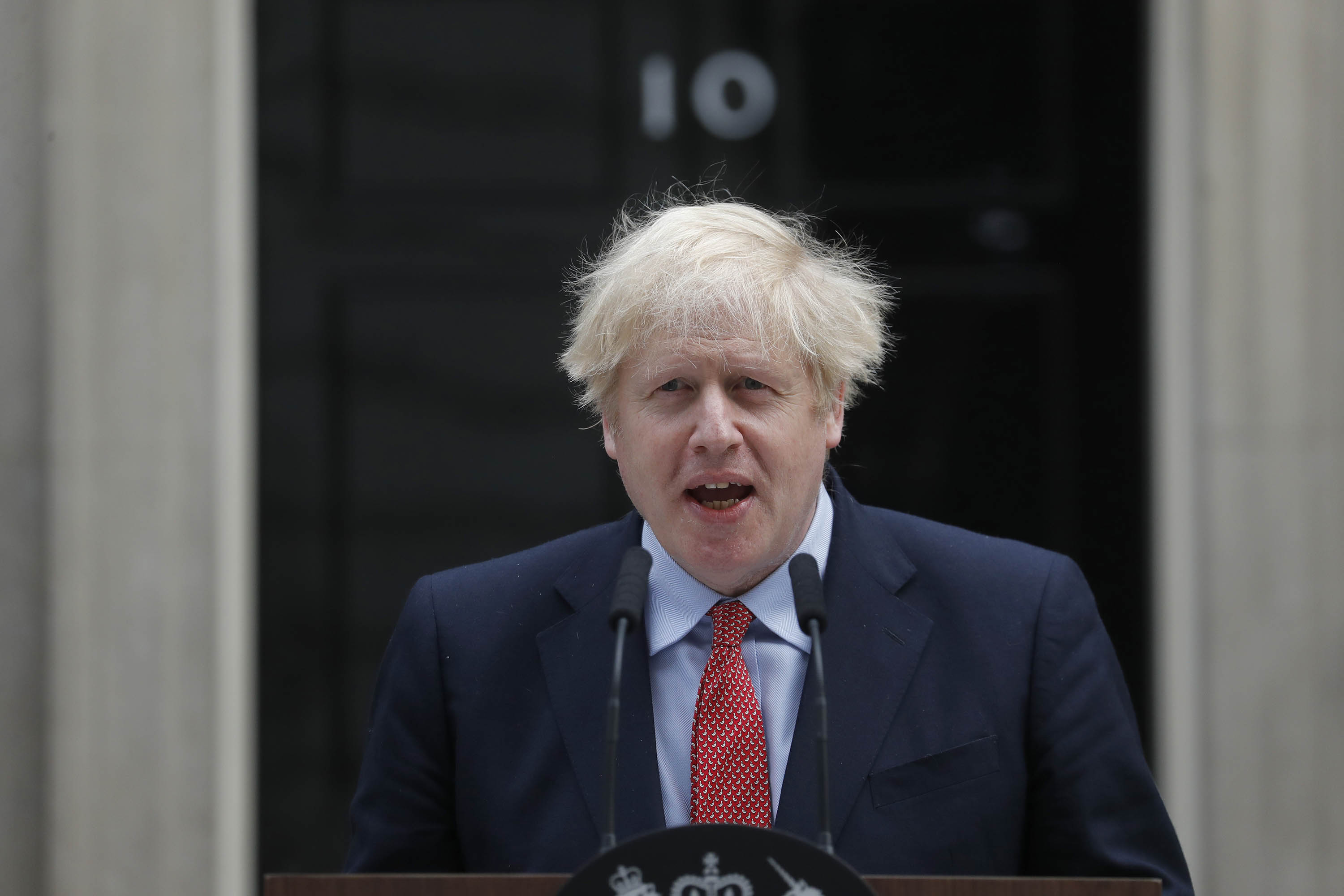 British Prime Minister Boris Johnson makes a statement at 10 Downing Street in London on Monday, April 27, his first day back at work after recovering from Covid-19.