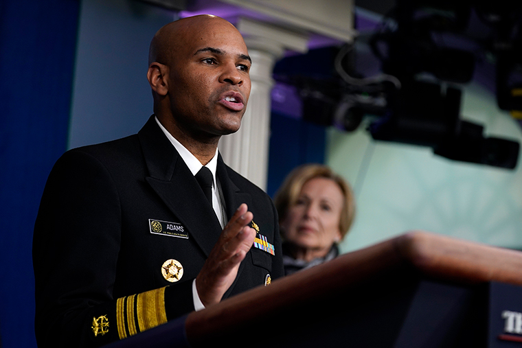 Surgeon General Jerome Adams speaks during press briefing with the coronavirus task force, at the White House, Thursday, March 19.