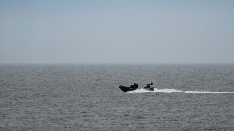 A security boat patrols the St. Lawrence River on Thursday, June 7, 2018. (THE CANADIAN PRESS/Sean Kilpatrick)