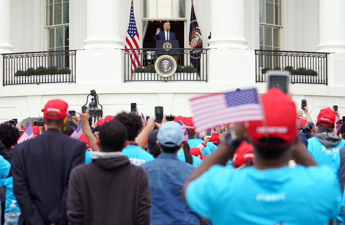 US President Donald Trump speaks publicly for the first time since testing positive for Covid-19 from the South Portico of the White House on October 10.