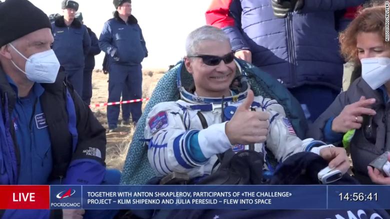 Mark Vande Hei rests outside of the Soyuz spacecraft after landing.