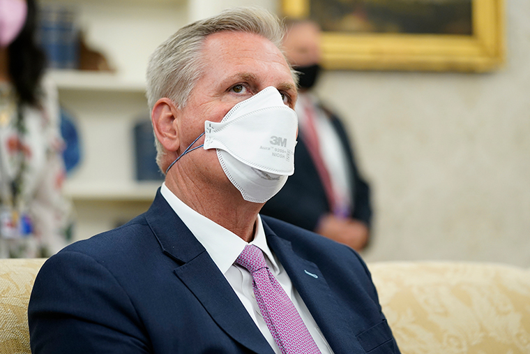 McCarthy attends a meeting with President Joe Biden and congressional leaders in the Oval Office of the White House, Wednesday, May 12.