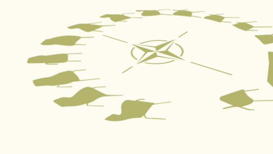 An illustration of the NATO symbol with a circle of chairs around it An illustration of the NATO symbol with a circle of chairs around it