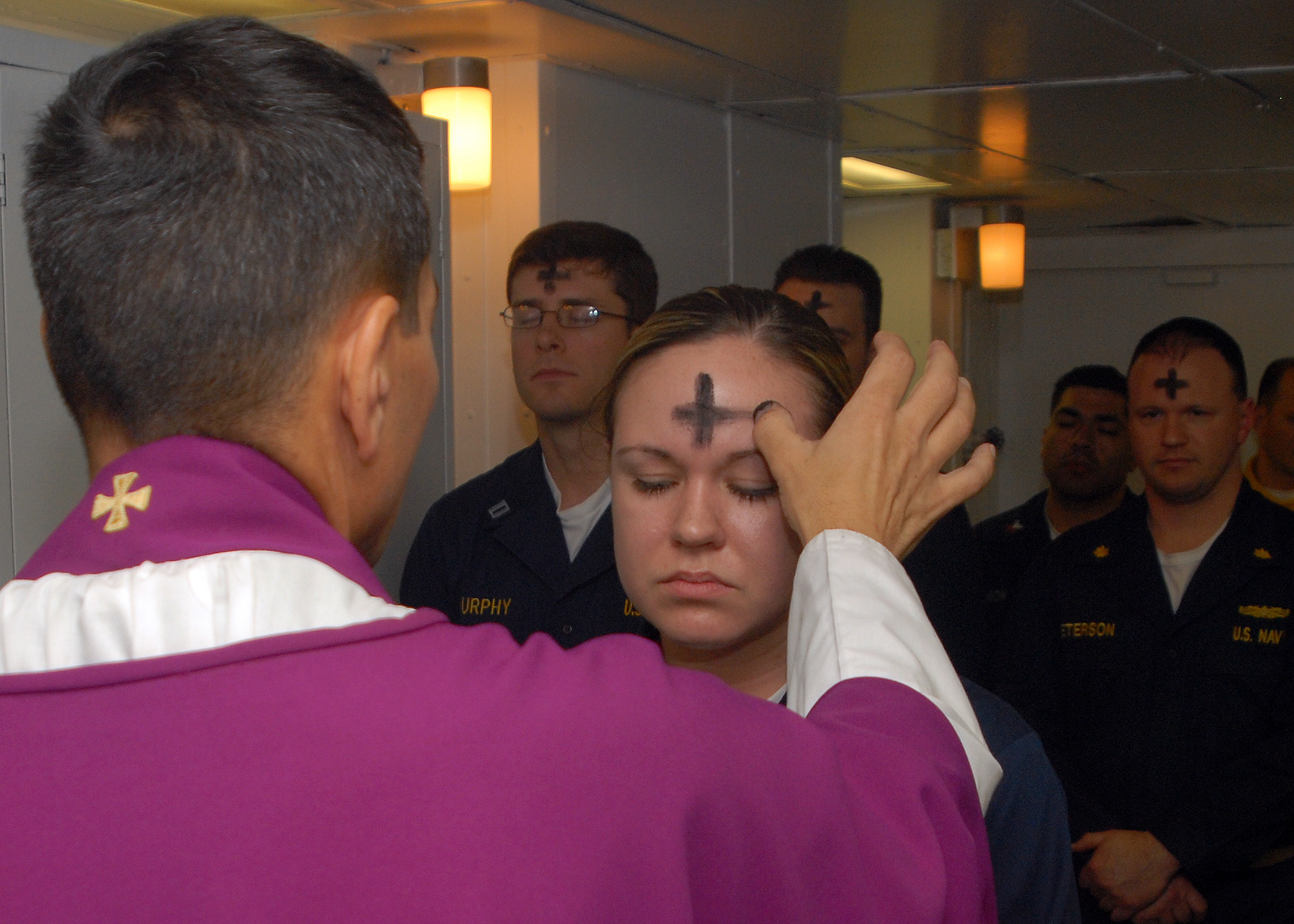 US_Navy_080206-N-7869M-057_Electronics_Technician_3rd_Class_Leila_Tardieu_receives_the_sacramental_ashes_during_an_Ash_Wednesday_celebration.jpg