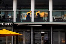 People dine in a restaurant on English Bay in Vancouver, B.C., Sunday, Oct. 11, 2020. THE CANADIAN PRESS/Darryl Dyck People dine in a restaurant on English Bay in Vancouver, B.C., Sunday, Oct. 11, 2020. THE CANADIAN PRESS/Darryl Dyck