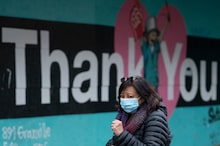 A woman wears a protective face mask to help prevent the spread of Covid-19 as she walks past a “Thank You” sign in downtown Vancouver, B.C., Saturday, Nov. 14, 2020. The daily numbers of Covid-19 are steadily rising with record numbers of new cases reported daily. THE CANADIAN PRESS/Jonathan Hayward A woman wears a protective face mask to help prevent the spread of Covid-19 as she walks past a “Thank You” sign in downtown Vancouver, B.C., Saturday, Nov. 14, 2020. The daily numbers of Covid-19 are steadily rising with record numbers of new cases reported daily. THE CANADIAN PRESS/Jonathan Hayward