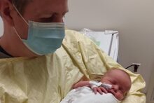 Dave McIntosh holds his newborn son in the Abbotsford Regional Hospital in this undated photo. Dave McIntosh has been able to hold his newborn son, but his wife Gill has not. Gill, 37, remains in the intensive care unit of the Abbotsford General Hospital, in an induced coma due to COVID-19. THE CANADIAN PRESS/HO-McIntosh family, *MANDATORY CREDIT* Dave McIntosh holds his newborn son in the Abbotsford Regional Hospital in this undated photo. Dave McIntosh has been able to hold his newborn son, but his wife Gill has not. Gill, 37, remains in the intensive care unit of the Abbotsford General Hospital, in an induced coma due to COVID-19. THE CANADIAN PRESS/HO-McIntosh family, *MANDATORY CREDIT*